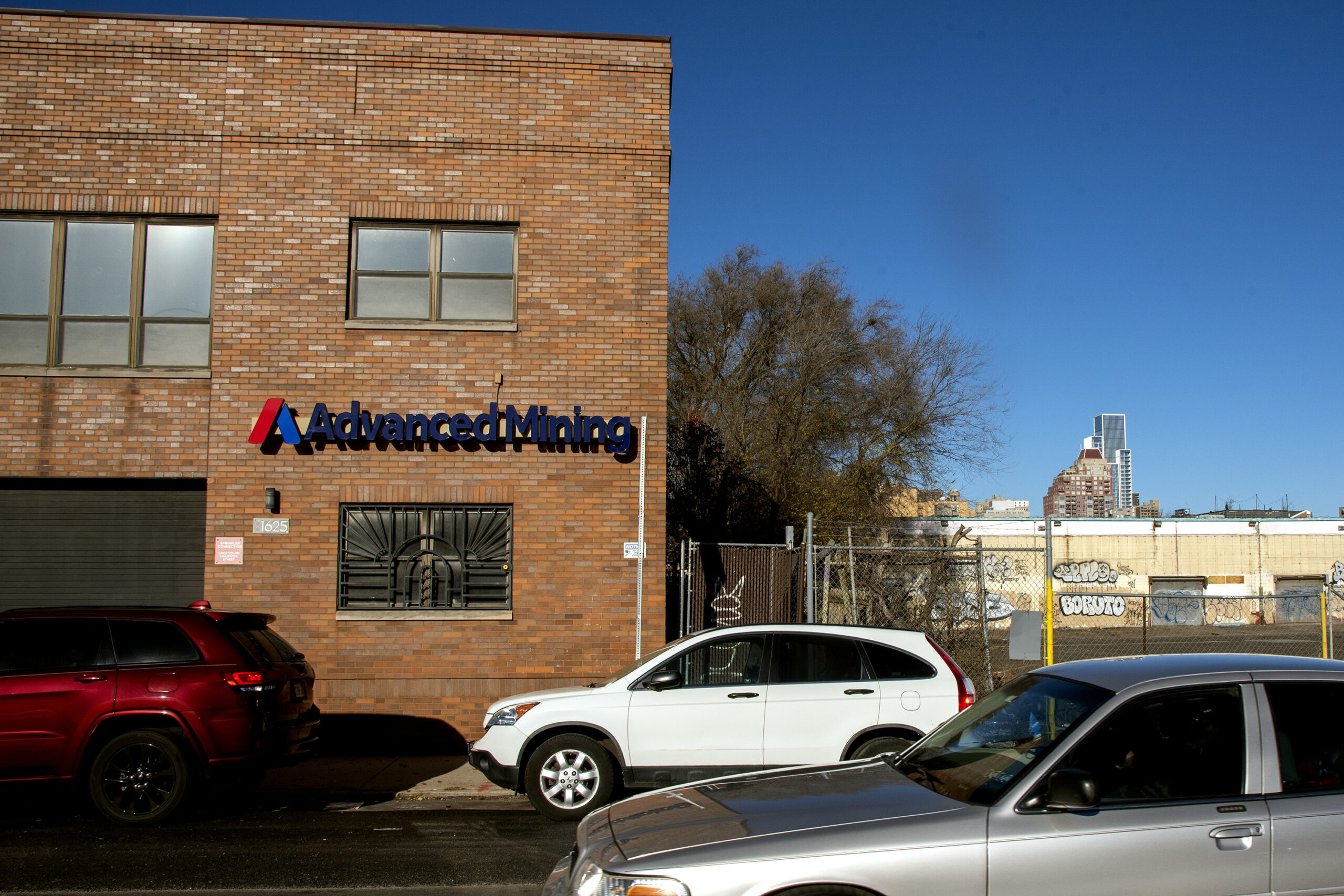 The scene at 1625 Washington Avenue Tuesday Dec. 13, 2022. The sign reads "Advanced Mining" the business that acquired the cryptocurrency company VBit Technologies which is facing several new lawsuits in federal court after its customers claim the company froze them out of millions of dollars in assets this summer.