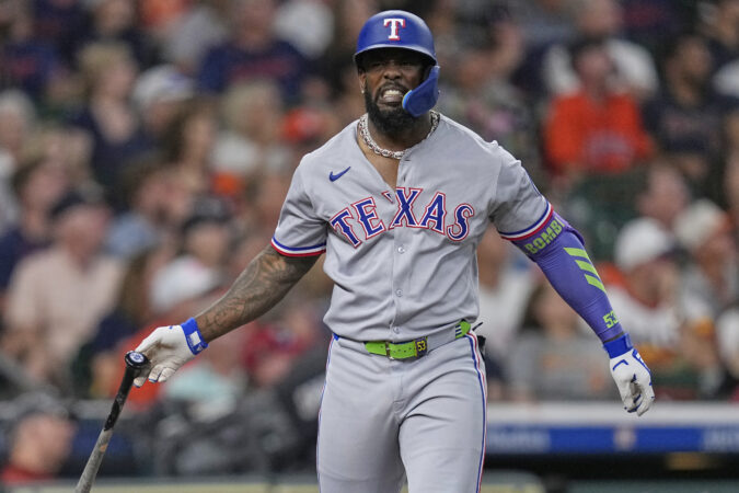 Five things to know about new Phillies outfielder Adolis García, from his defection to his light bulb-shaped head