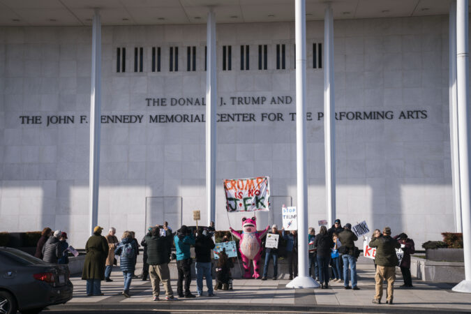 Protesters gather on Dec. 20 in front of the John F. Kennedy Center for the Performing Arts after President Donald Trump’s name was added to the building.