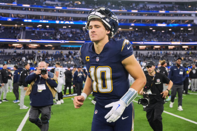 Chargers QB Justin Herbert breaks bone in non-throwing hand vs. Raiders; status for Eagles game uncertain