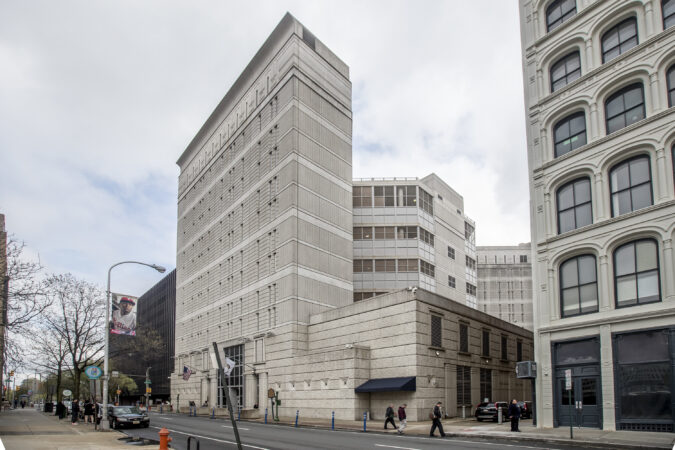 A former Philly lawyer who tried to get a cell phone to an accused gang leader in jail was sentenced to probation