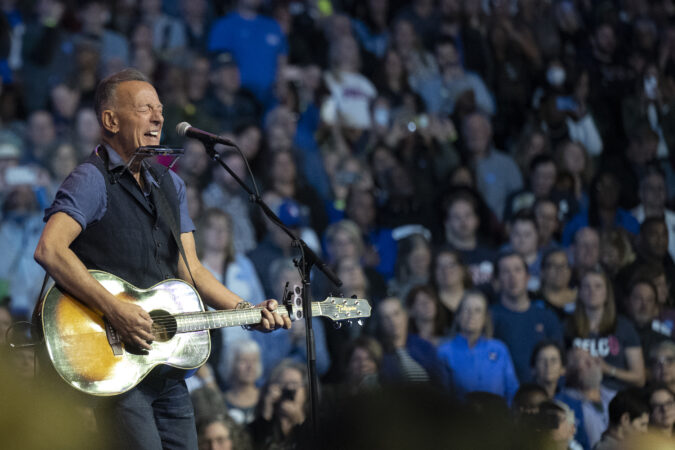 Bruce Springsteen performs on Monday, Oct. 28, 2024, during a Democratic concert rally at the Liacouras Center at Temple University in Philadelphia, Pa. Springsteen has released a new anti-ICE protest song called "Streets of Minneapolis" in response to the deaths of Renee Good and Alex Pretti.