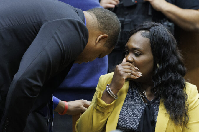 Atlantic City Mayor Marty Small and his wife Superintendent of Schools La'Quetta Small chat before start of arraignment. The Atlantic County prosecutor said Friday his office will not go forward with a child abuse trial against La'Quetta Small. Marty Small was acquitted of charges that he beat and abused his daughter.