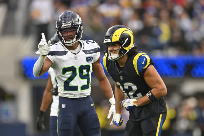 Seattle Seahawks cornerback Josh Jobe, left, celebrates after stopping a pass intended for Los Angeles Rams wide receiver Puka Nacua during the second half of an NFL football game Sunday, Nov. 16, 2025, in Inglewood, Calif. (AP Photo/Katie Chin)