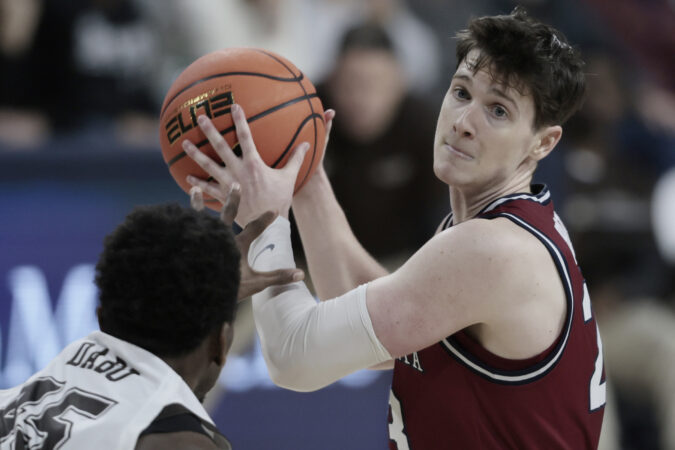 Harvard men slip past Penn, 64-63