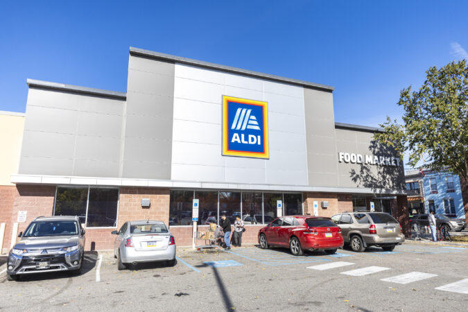Family budgets are stretched, and bargain grocer Aldi seizes the moment in a rapid expansion