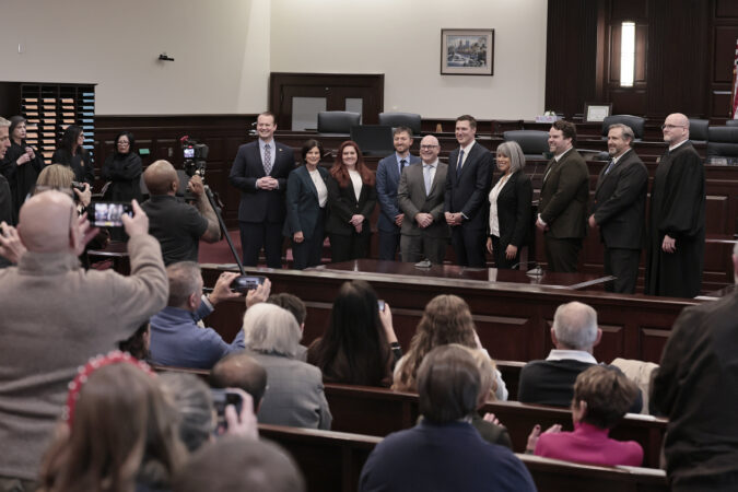 (L-R) Chester County Commissioner Eric Roe, Chester County Commissioner Vice-Chair Marian Moskowitz, Coroner Sophia Garcia-Jackson, Controller Nick Cherubino, Magisterial District Judge Anthony diFrancesca, Chester County Commissioner Chair Josh Maxwell, Clerk of Courts Caroline Bradley, Prothonotary Alex Christy, Magisterial District Judge Joe Heffern and Magisterial District Judge James C. Kovaleski stand for a group photo after the ceremonial administration of oaths, for elected officials and magisterial district judges, at the Chester County Justice Center on Saturday, Jan. 3, 2026.