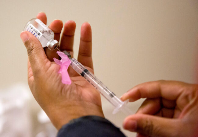 Flu season surged in U.S. over the holidays and already rivals last winter’s harsh epidemic