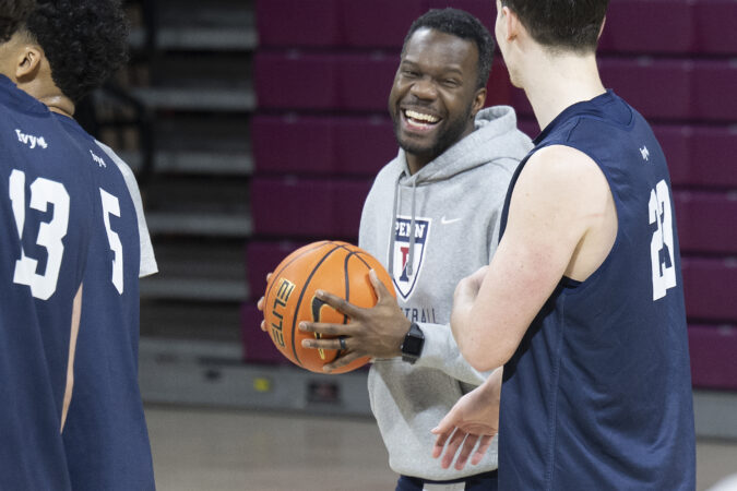 Ronald Moore became a national sensation as a player when Siena pulled off a famous NCAA Tournament upset in 2009. Now he's reunited with Fran McCaffery on Penn's coaching staff.
