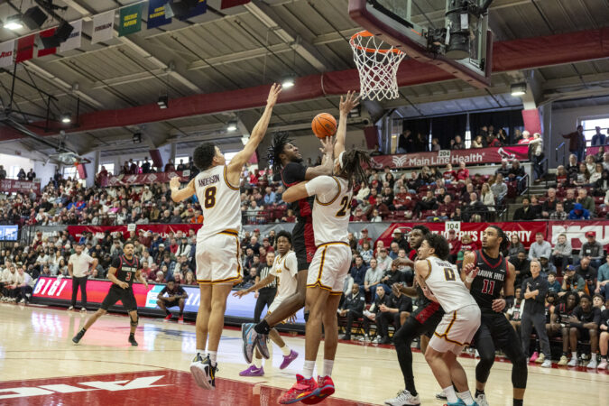 Dasear Haskins (center) led the Hawks with a career-high 24-point effort in Saturday's win over Loyola (Ill.) at Hagan Arena.