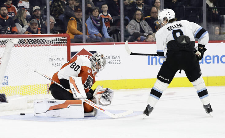 Utah Mammoth's Clayton Keller (right) scores a second period goal past Flyers goaltender Dan Vladar on Thursday.