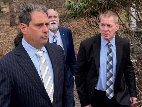 Lenny Dykstra (right) leaving a courtroom in Hawley, Pa., after waiving his preliminary hearing on two misdemeanor drug charges. He appeared with defense attorneys Matthew Blit (left) and Thomas Mincer.