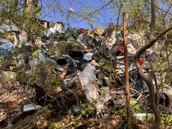This is one of Philly’s biggest illegal dumps. Cleaning it up is a logistical nightmare.