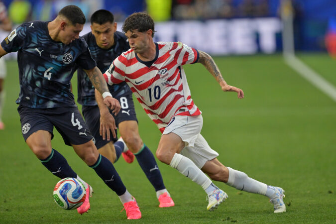 Christian Pulisic (right) and the U.S. men's soccer team hope to make a historic run in the knockout rounds of this World Cup.