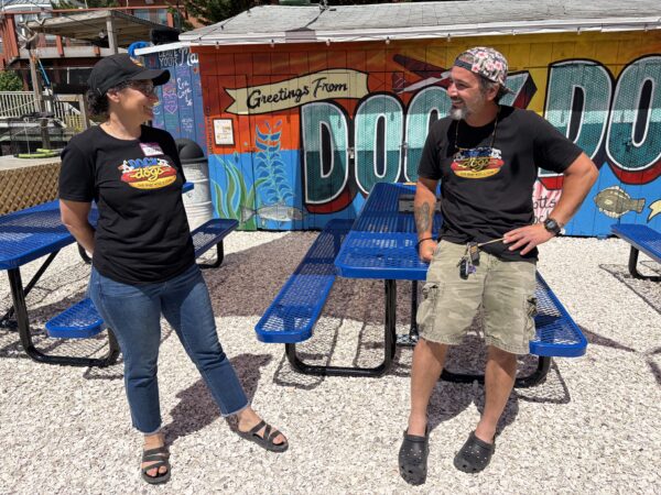 Hillary Bor, left, and Tim Nedzwecky, at their hot dog stand on the bay in Margate, Docks Dogs. Bor is the former owner of Pumpkin BYOB in Philadelphia, which closed in 2024.