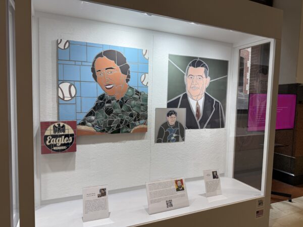 Mosaic of Effa Louise Manley and drawing of Bert Bell at City Hall on Thursday.