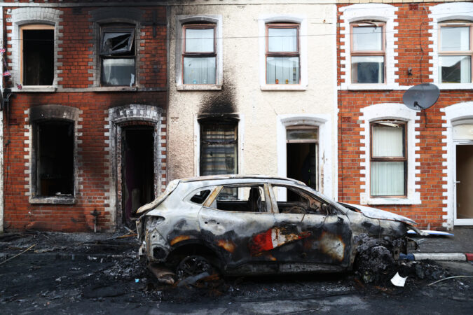 After two nights of riots, Belfast was on the brink. Then it remembered its hard history.