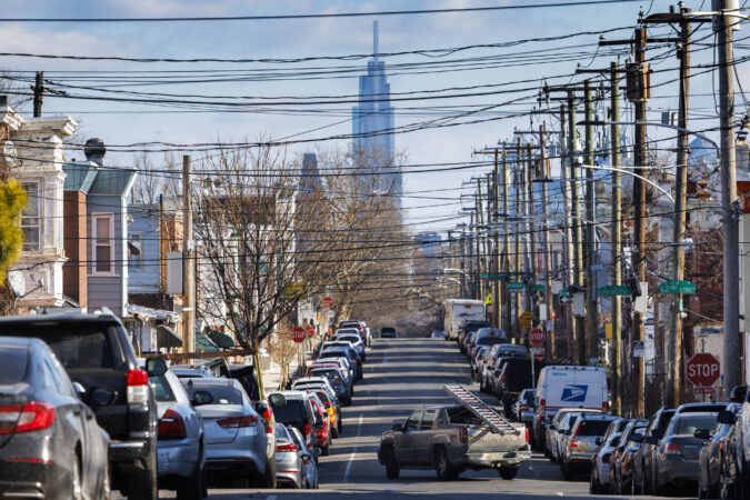 The Comcast tower rises over Philadelphia, looking east on Race Street from 63rd Street. The company employs 15,000 people in the area.