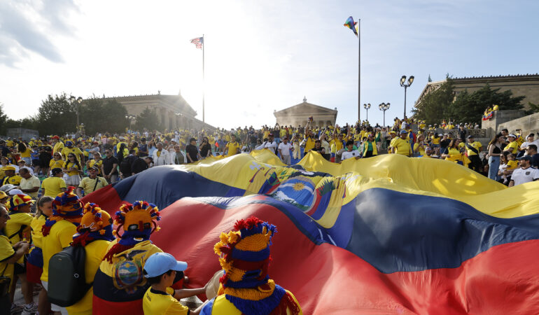 Ecuadorian soccer fans attend a pep rally at the Philadelphia Museum of Art steps ahead of their opening World Cup match against the Ivory Coast. Unfortunately, they decided to put a jersey on Rocky.