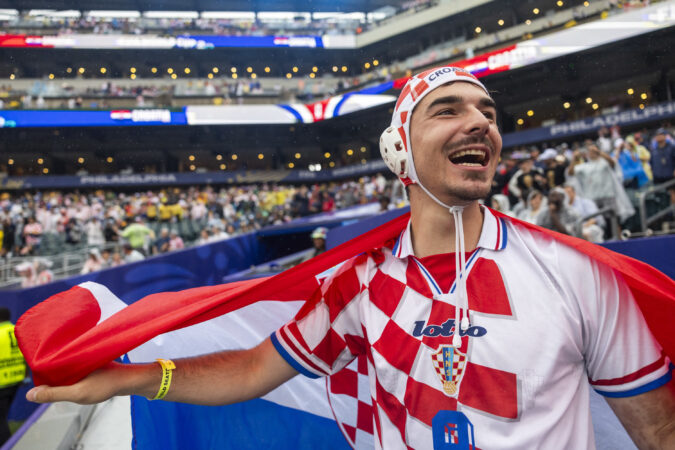 Carter Pike, 23, of Greenville, S.C., cheers for Croatia before Saturday's World Cup game against Ghana.