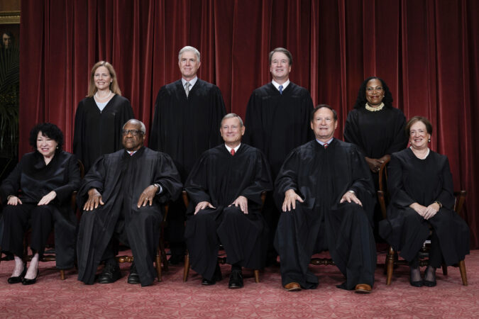 The justices of the U.S. Supreme Court. Bottom row, from left: Sonia Sotomayor, Clarence Thomas, Chief Justice John Roberts, Samuel Alito, and Elena Kagan. Top row, from left: Amy Coney Barrett, Neil Gorsuch, Brett Kavanaugh, and Ketanji Brown Jackson. The nation's future is in their hands as almost never before, writes Susan Sullivan.