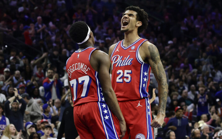 Dominick Barlow (right) averaged 7.7 points, 4.8 rebounds, and 1.2 assists and thriving as a cutter and high-energy player in 71 games with 59 starts.