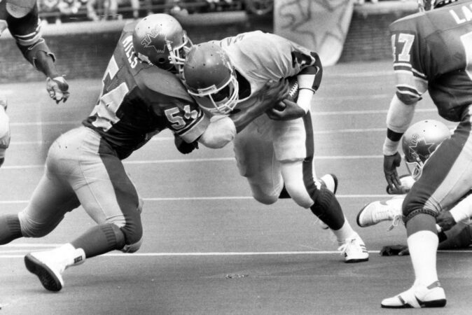 Sam Mills (left) in action with the Stars in 1984.