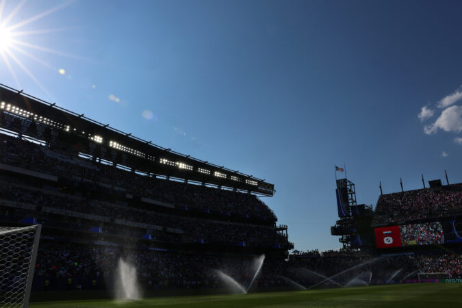The sun hangs over Lincoln Financial Field during the hydration break in the first half as France plays Paraguay in the FIFA World Cup Round of 16 match in Philadelphia on Saturday, July 4, 2026.