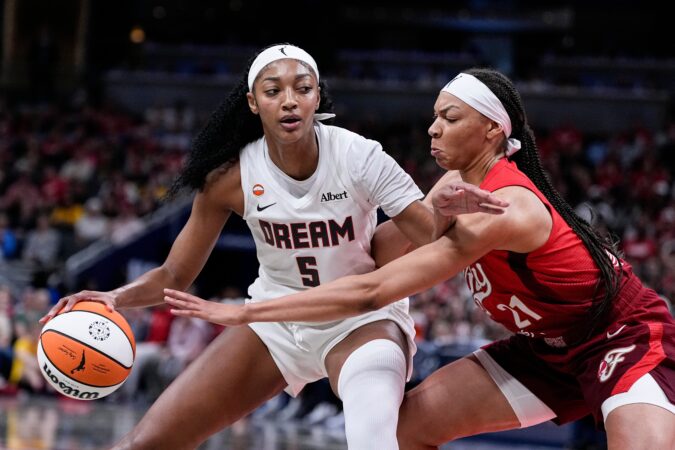 Dream forward Angel Reese (left) was named a WNBA All-Star reserve.