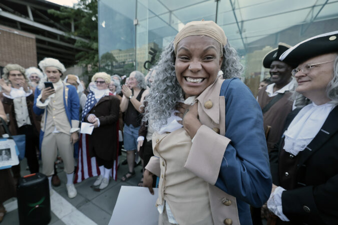 Kiya Burgess of Philadelphia wins the Ben Franklin lookalike contest that was held behind the Presidents House on Independence Mall in Philadelphia on Friday, July 3, 2026.