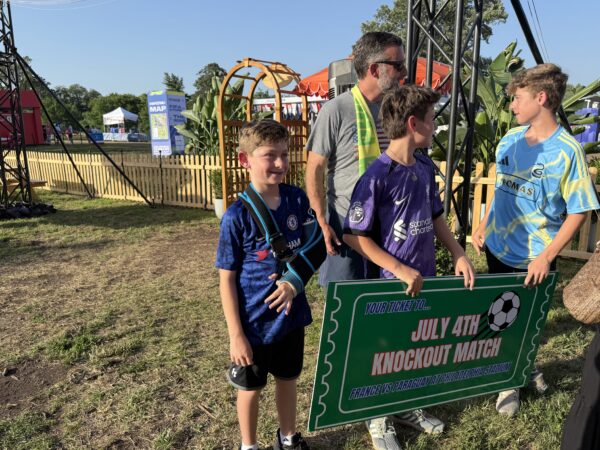 Ben Snyder (left) missed out on a summer full of activities because of a broken arm, but now the 9-year-old is heading to a knockout-round match at Philadelphia Stadium (aka Lincoln Financial Field) on Saturday.