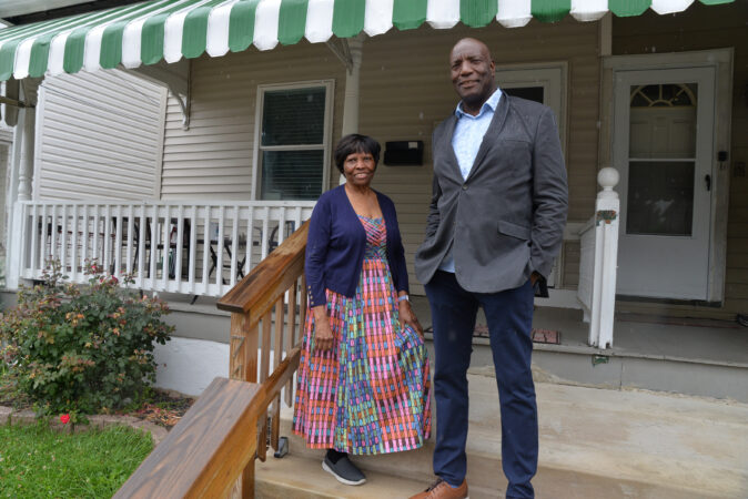 Minnie McNeil and her son Andrew McNeil on the steps of a house they rehabilitated on Merchant Street in Coatesville. The McNeil family has been an advocate for unhoused people in Coatesville since the early 1980s.