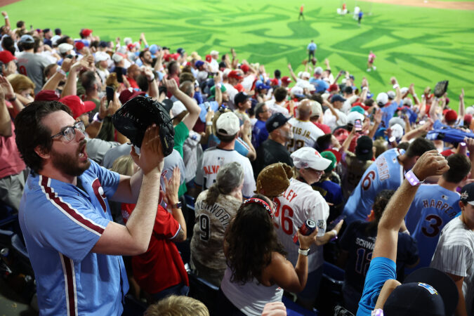 Phillies fans cheer as Phillies Kyle Schwarber advances to the finals of the Home Run Derby.
