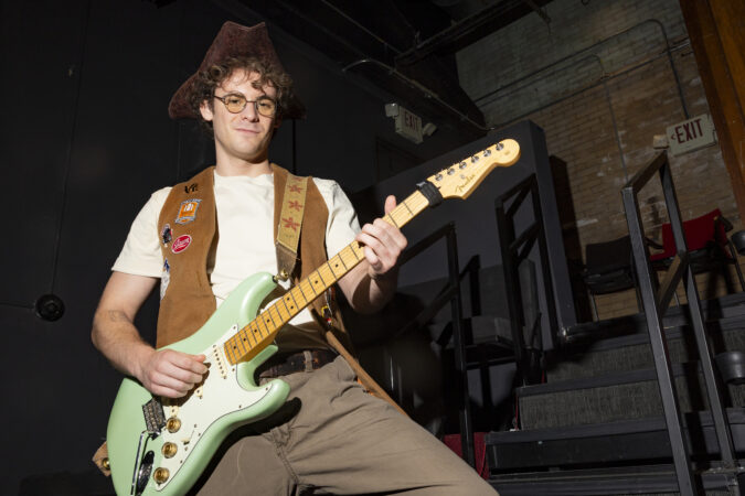 Kohl Pilgrim, the actor bringing Ben Franklin’s rock n’ roll persona to life, stands for a portrait inside the Fringe Arts Theatre during a dress rehearsal for the upcoming musical “The Sound of America” on Wednesday, June 24, 2026.